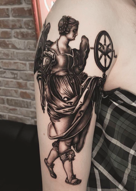 Justitia tattoo meanings  popular questions